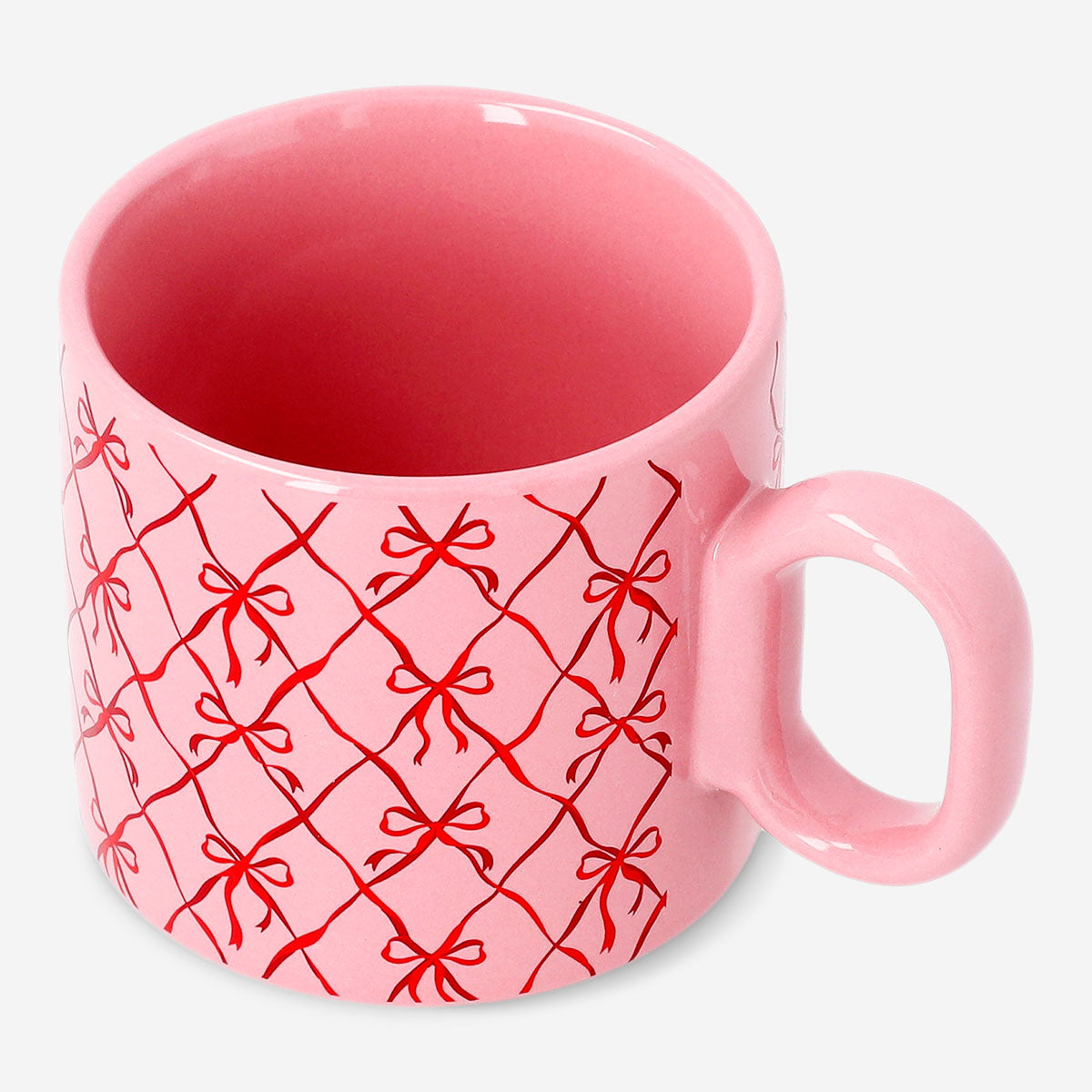 Flying Tiger Copenhagen 300ml mug with bow print, kitchen ceramic cup with colorful bow design on white background.