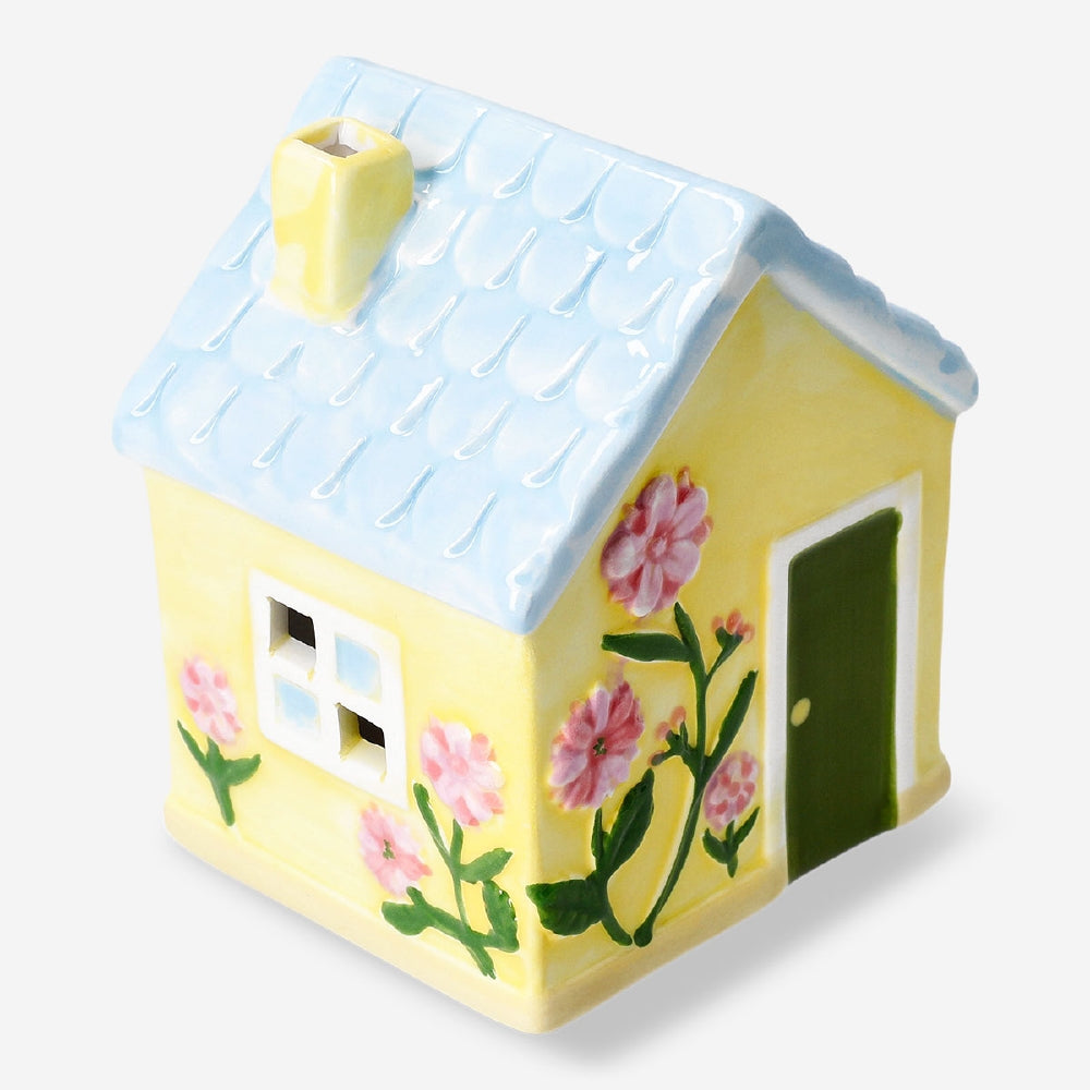 Decorative yellow ceramic house, 13 cm tall, from Flying Tiger Copenhagen, perfect for home decor or tabletop display.