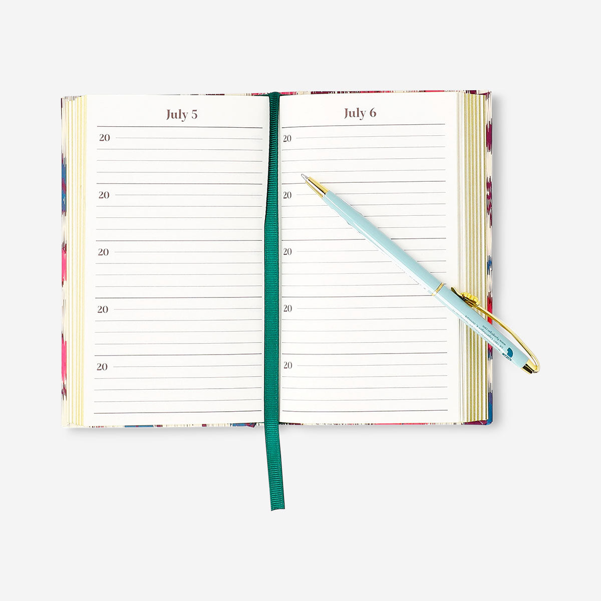Flying Tiger Copenhagen five-year diary in English, with a colorful cover and open pages for daily entries.
