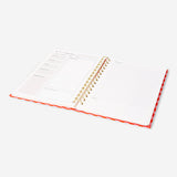 Flying Tiger Copenhagen office recipe book with colorful pages and creative culinary ideas for workspace kitchens.