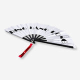 Silver fabric fan with strap from RuPaul's Drag Race x Flying Tiger Copenhagen, featuring a textile design and compact size.