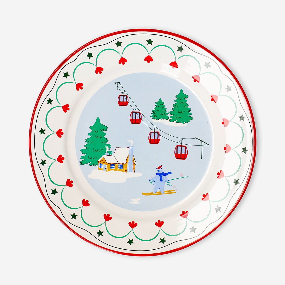 Round ceramic plate with a 21 cm ski village print, perfect for kitchen decor, by Flying Tiger Copenhagen.