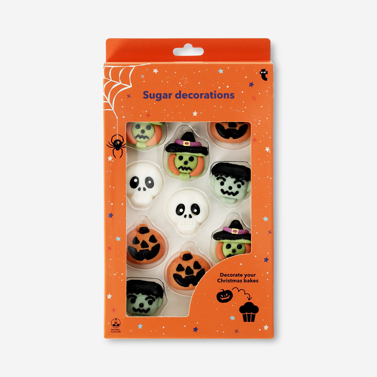 Halloween character icing decorations from Flying Tiger Copenhagen on food surface, colorful and festive for cake decorating.