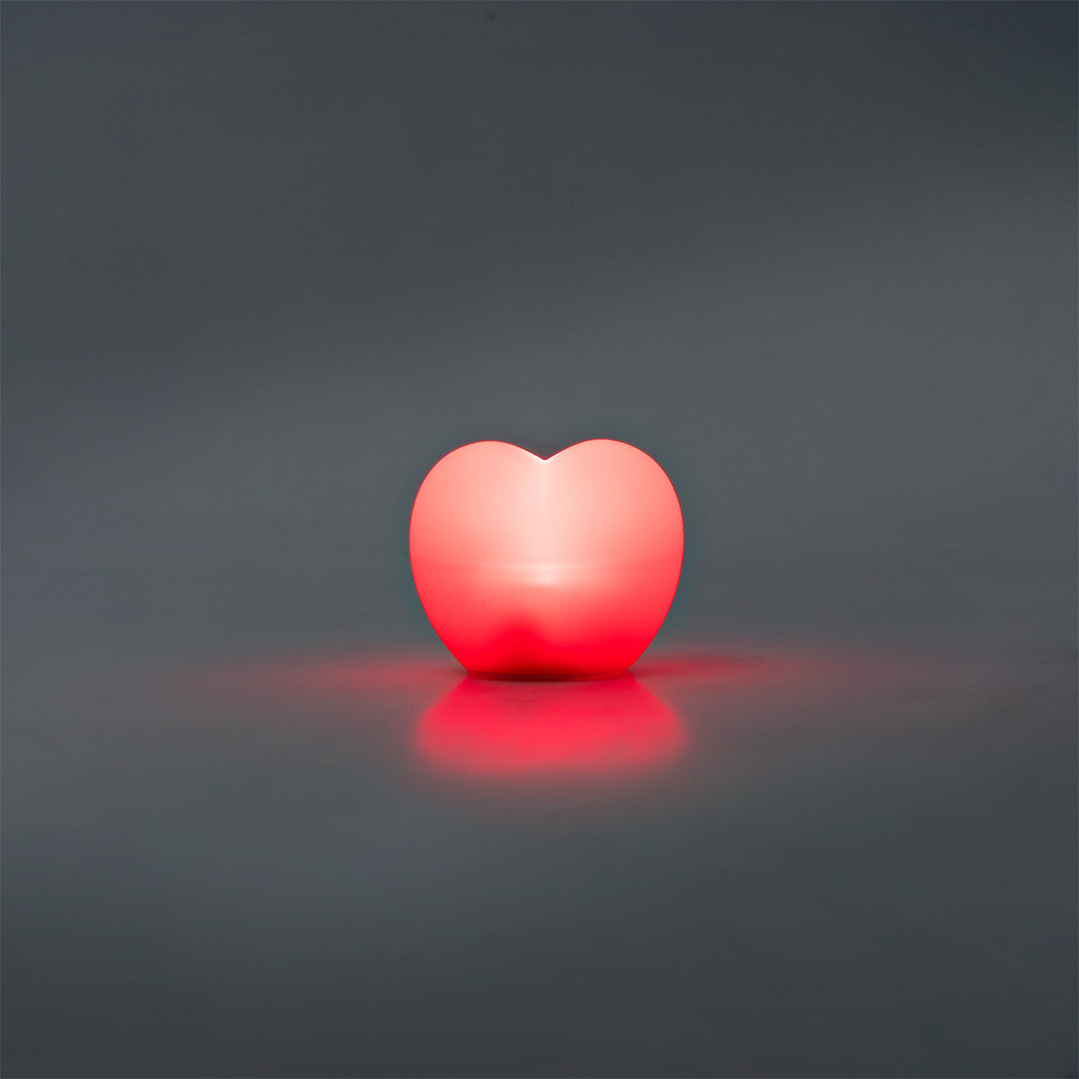 Red heart-shaped Cosy lamp from Flying Tiger Copenhagen, cozy home decor with soft lighting and playful heart design.