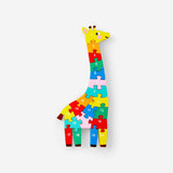 Wooden giraffe number puzzle toy from Flying Tiger Copenhagen showing colorful numbered giraffe pieces for children.