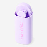 Purple handheld fan from Flying Tiger Copenhagen, compact gadget for staying cool, with a sleek design and easy-to-hold handle.