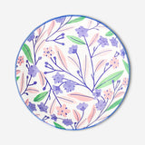 Small ceramic low bowl with colorful floral design, 14 cm, from Flying Tiger Copenhagen kitchenware collection.
