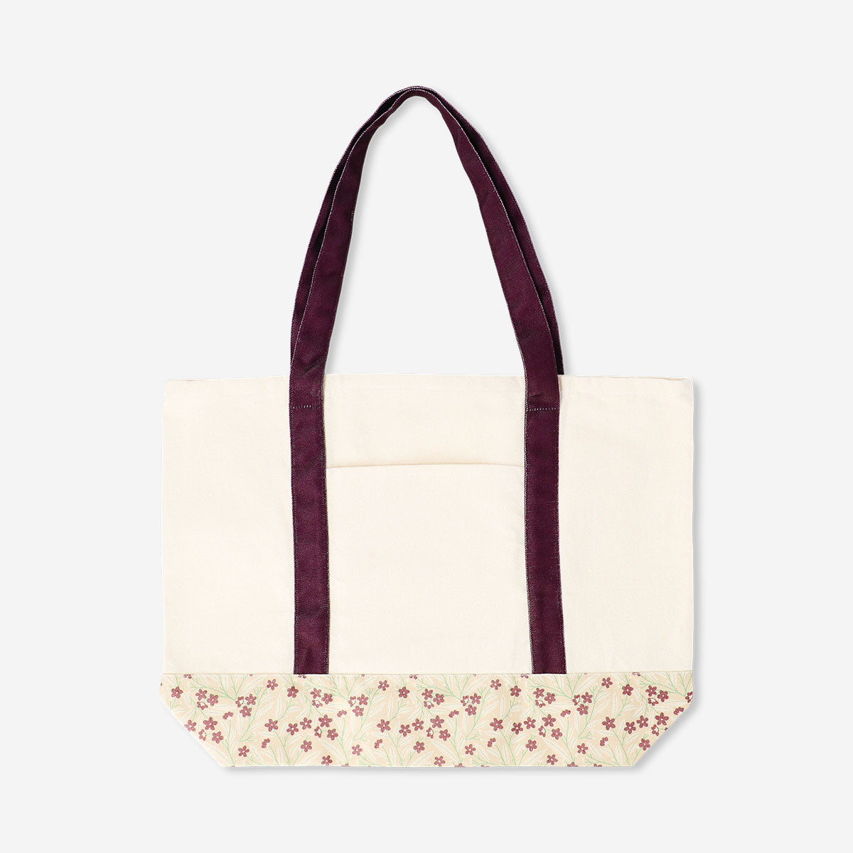 Textile shopper bag with floral pattern and burgundy strap, stylish and spacious shopping tote by Flying Tiger Copenhagen.