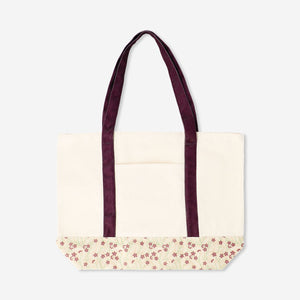 Flying Tiger Copenhagen floral shopper bag with a textile body and burgundy strap, showcasing vibrant floral patterns.
