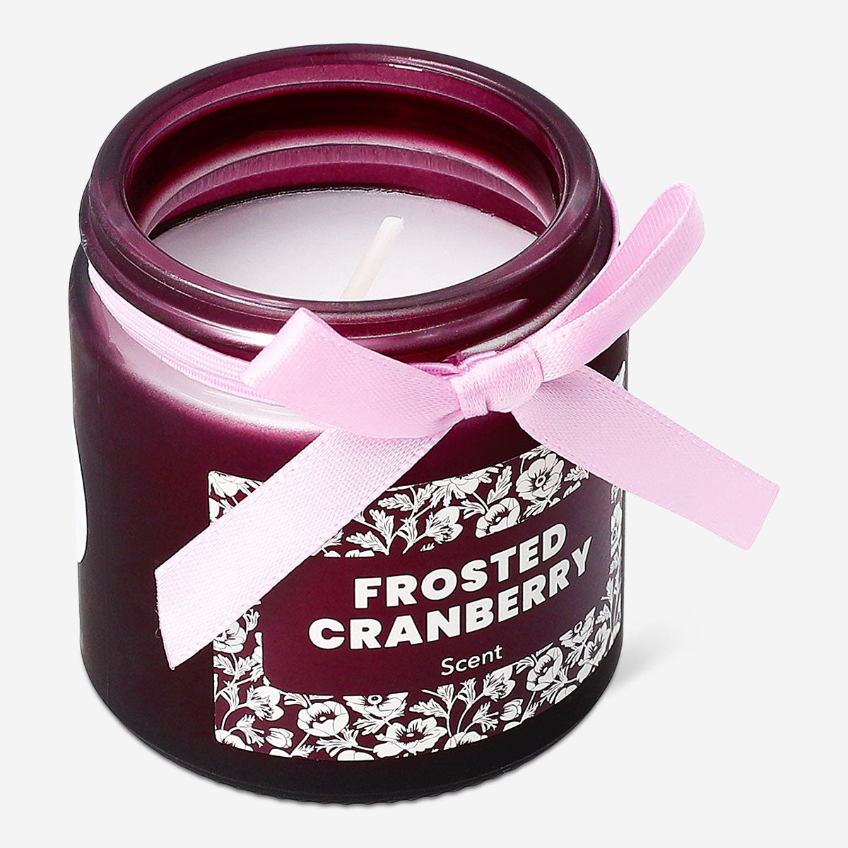 Frosted cranberry scented candle in a glass jar, home fragrance by Flying Tiger Copenhagen, with a frosted finish and festive appearance.