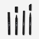 Set of four black permanent markers from Flying Tiger Copenhagen, ideal for office writing and labeling tasks.