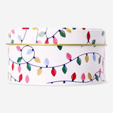 Round tall cake tin with Christmas string lights print, kitchen storage container by Flying Tiger Copenhagen.