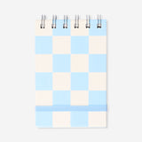 Blue chequered spiral bound notepad