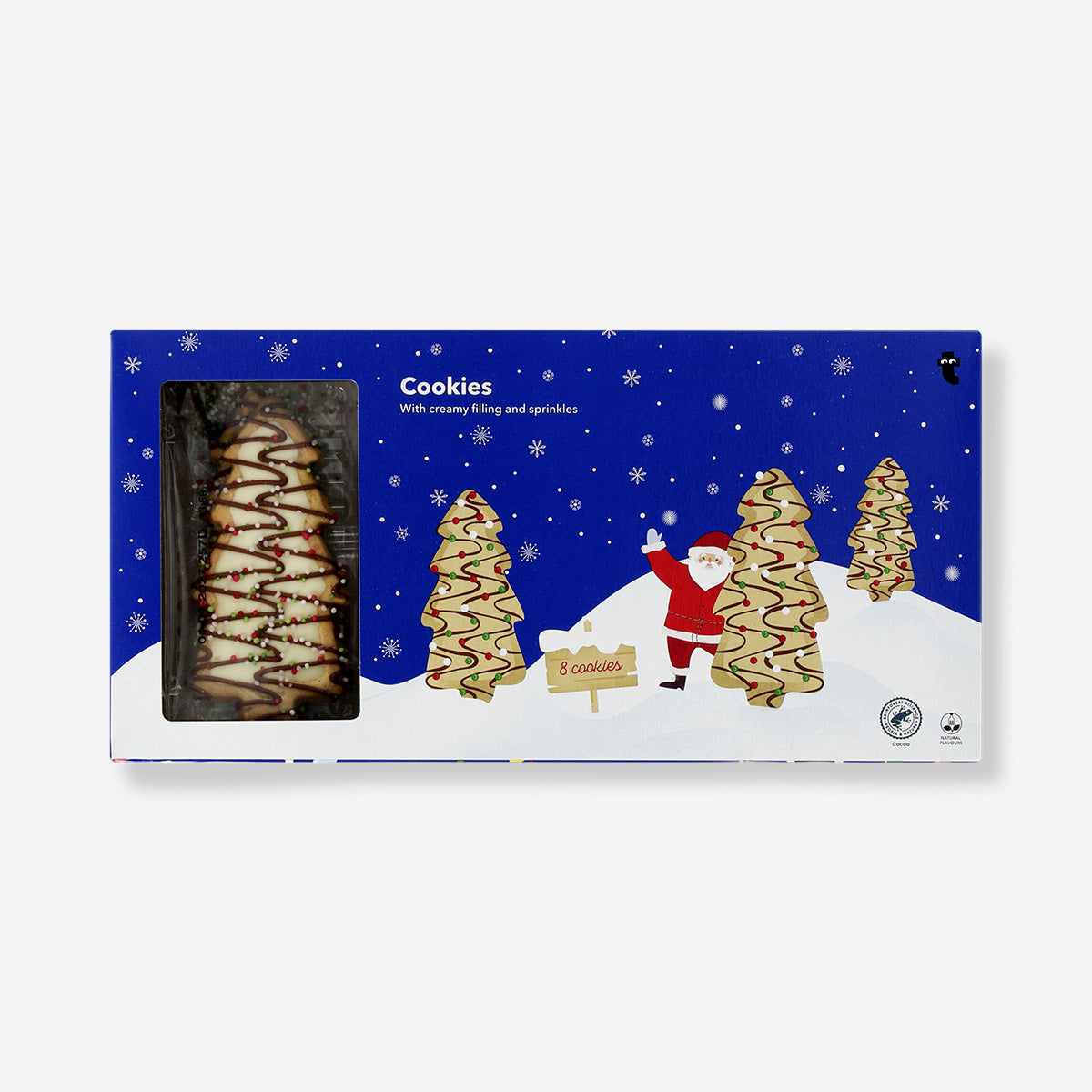 Christmas tree-shaped cookies with white cream and colorful sprinkles, decorated as festive holiday treats from Flying Tiger Copenhagen.