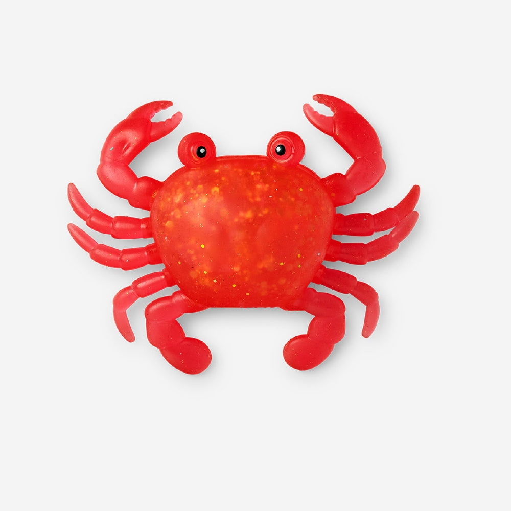 Red crab press me toy gadget from Flying Tiger Copenhagen, soft plastic crab with pressing mechanism and colorful design.
