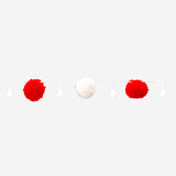 Red and white pompom string lights for home decor, featuring colorful hanging pom-poms from Flying Tiger Copenhagen.