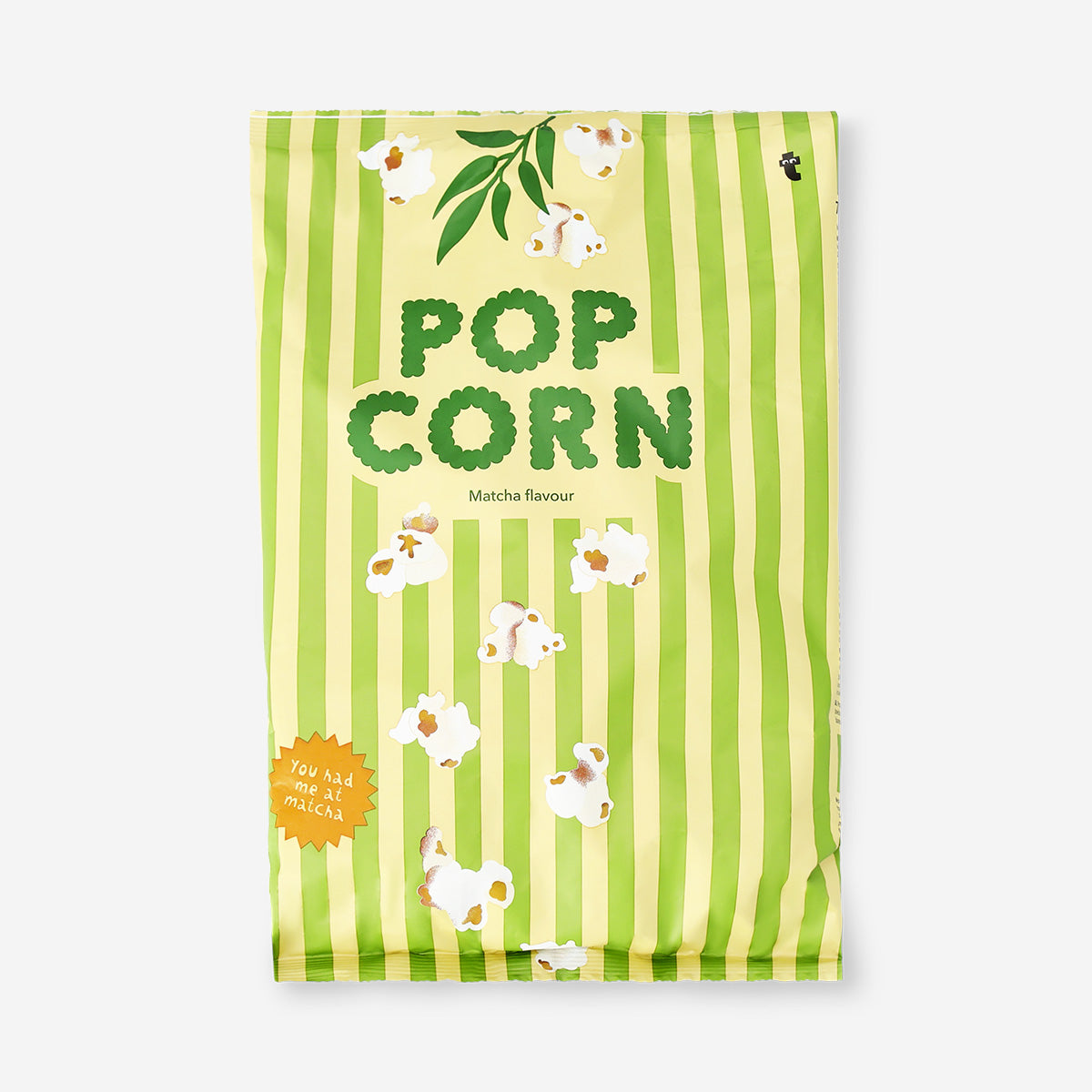 Popcorn with matcha tea flavor in a bowl, Flying Tiger Copenhagen food product, green tea-flavored snack with vibrant green coloring.