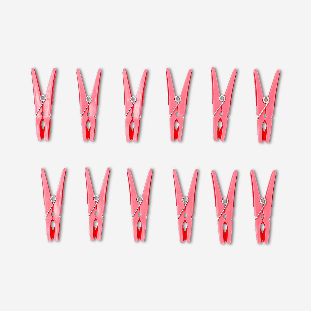Pink flower clothes pegs set of 12 from Flying Tiger Copenhagen, colorful home laundry clips with floral design on a white background.