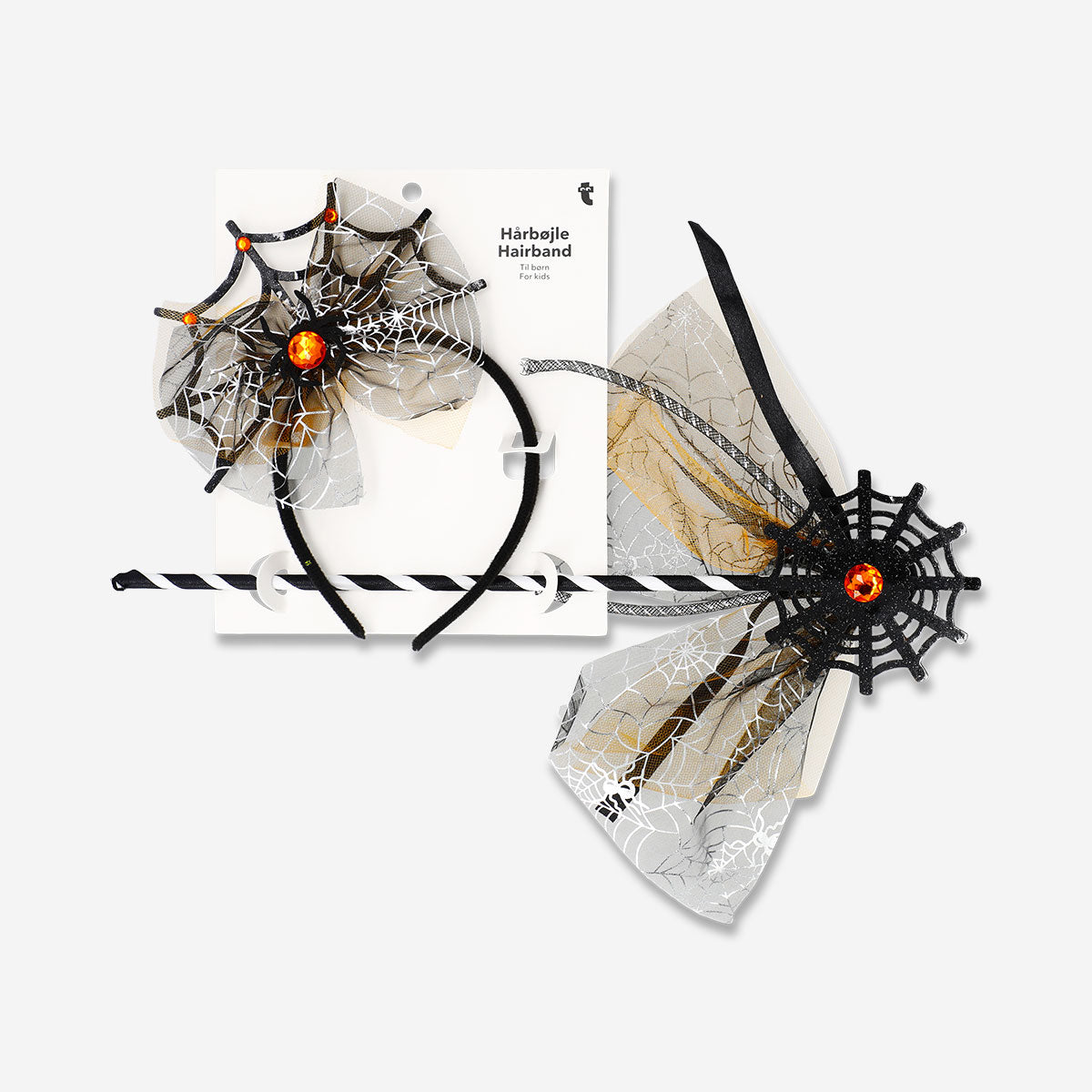 Kids' spider web hairband with wand for party costumes, featuring black web design and playful accessories by Flying Tiger Copenhagen.
