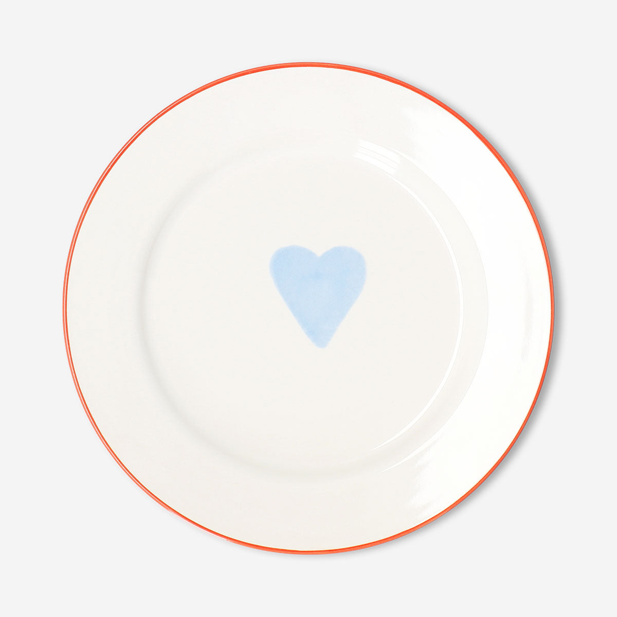 Heart-shaped 21 cm kitchen plate from Flying Tiger Copenhagen, featuring a playful design on a white ceramic surface.