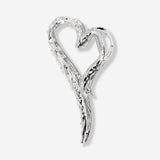 Silver heart textile hair clip with a decorative heart design, perfect for adding a charming touch to hairstyles.