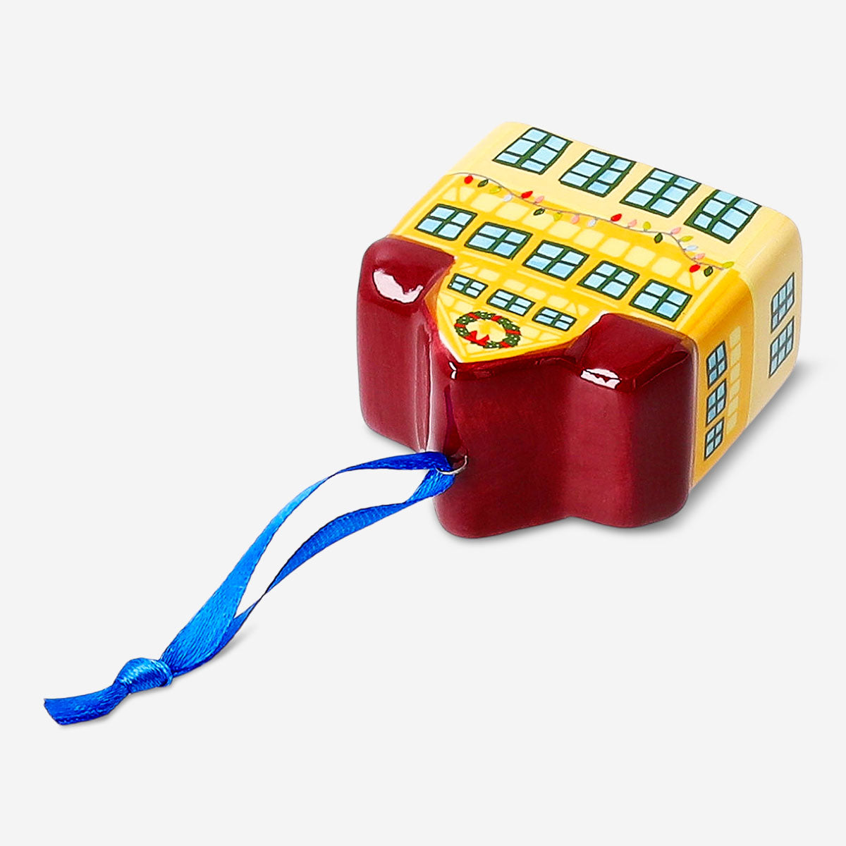 Yellow ceramic house hanging ornament, decorative home accessory by Flying Tiger Copenhagen, with a charming, detailed design.