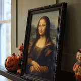 Haunted picture in frame gadget by Flying Tiger Copenhagen, 36 cm spooky decor with eerie visual in a black frame.