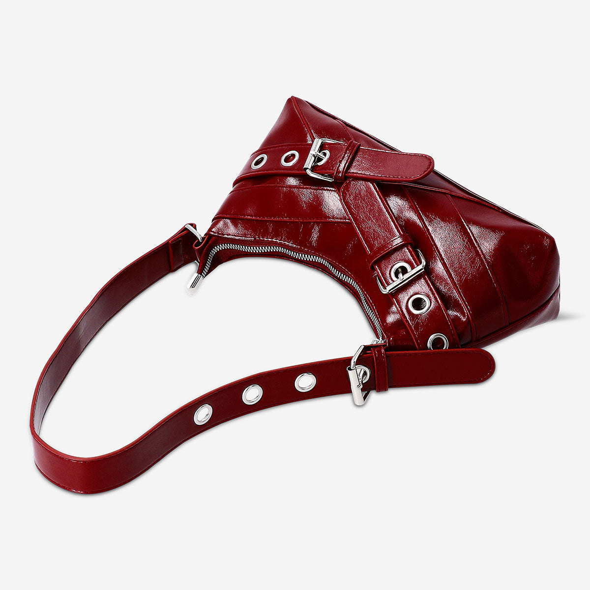 Red textile shoulder bag with buckle details from Flying Tiger Copenhagen, featuring a stylish and functional design.