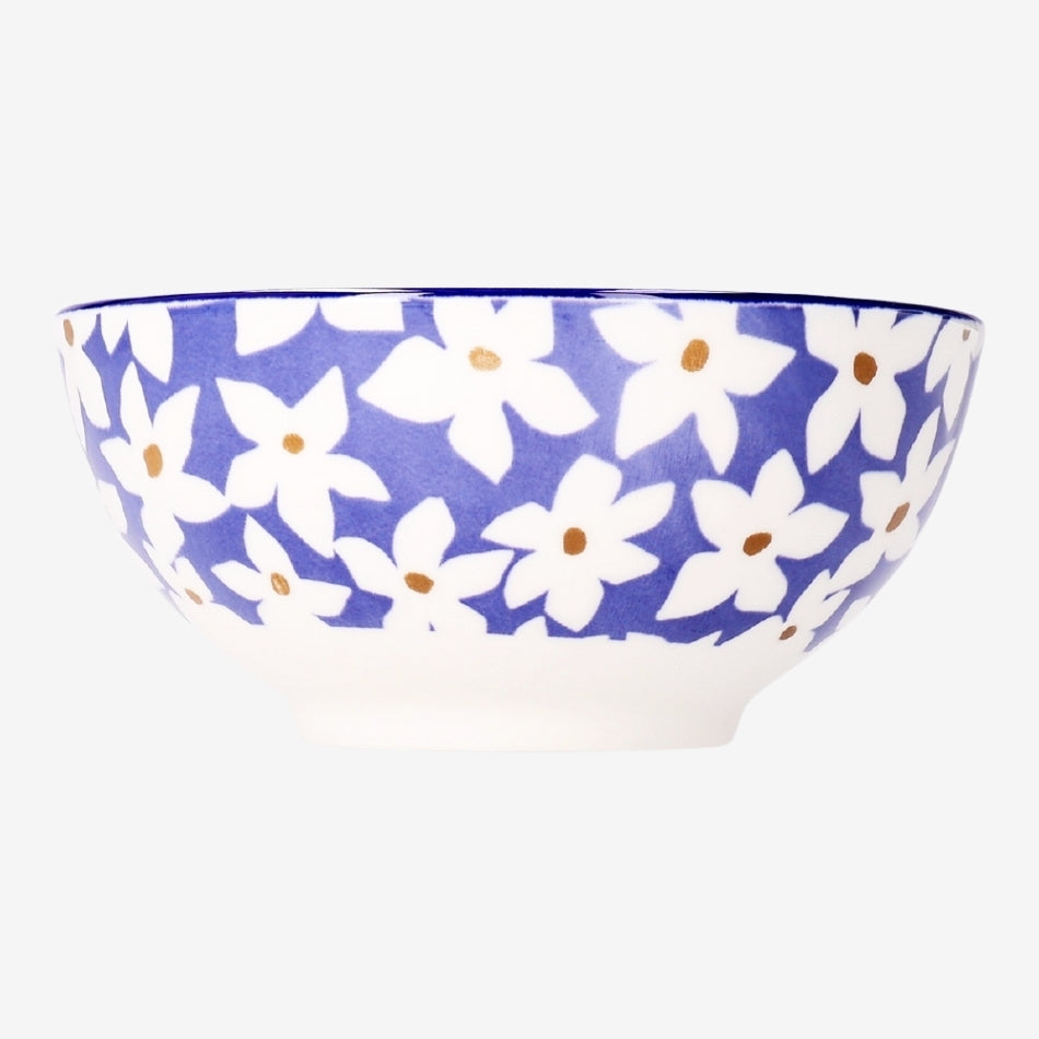 Ceramic kitchen bowl with floral design, 14 cm diameter, from Flying Tiger Copenhagen, featuring colorful flower patterns.