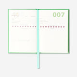 Flying Tiger Copenhagen A6 book journal for office use, featuring a compact design and lined pages for note-taking.