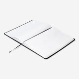 Two black A4 office notebooks with elastic rubber bands from Flying Tiger Copenhagen, showing their covers and elastic closures.