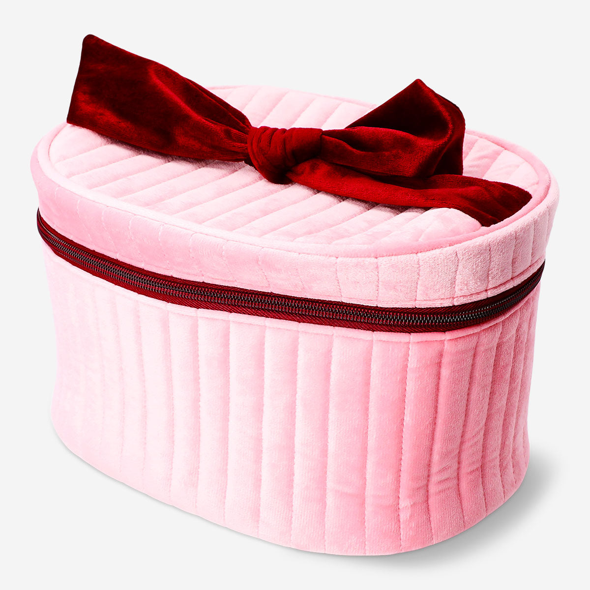 Pink velvet cosmetic bag with bow from Flying Tiger Copenhagen, personal care accessory with soft fabric and stylish design.