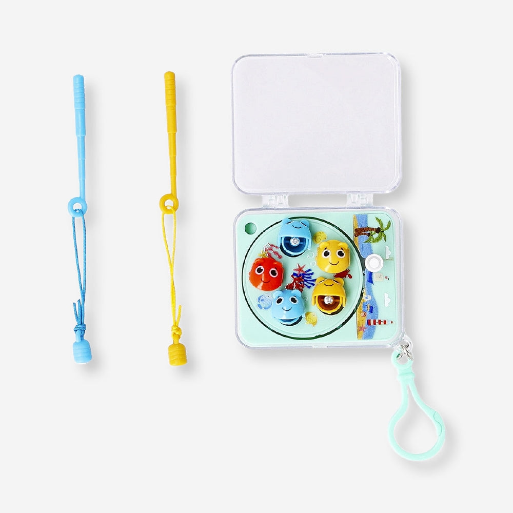Mini fishing game by Flying Tiger Copenhagen featuring colorful fishing rods and a small game board for fun play.