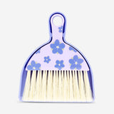 Purple dustpan set with floral design from Flying Tiger Copenhagen, ideal for home cleaning and organization.