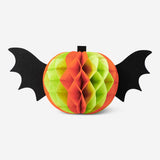 Two honeycomb paper pumpkin table decorations with wings, Flying Tiger Copenhagen party decor, colorful and festive for celebrations.