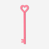 Pink heart-shaped key ballpoint pen from Flying Tiger Copenhagen, stylish office writing instrument with playful design.