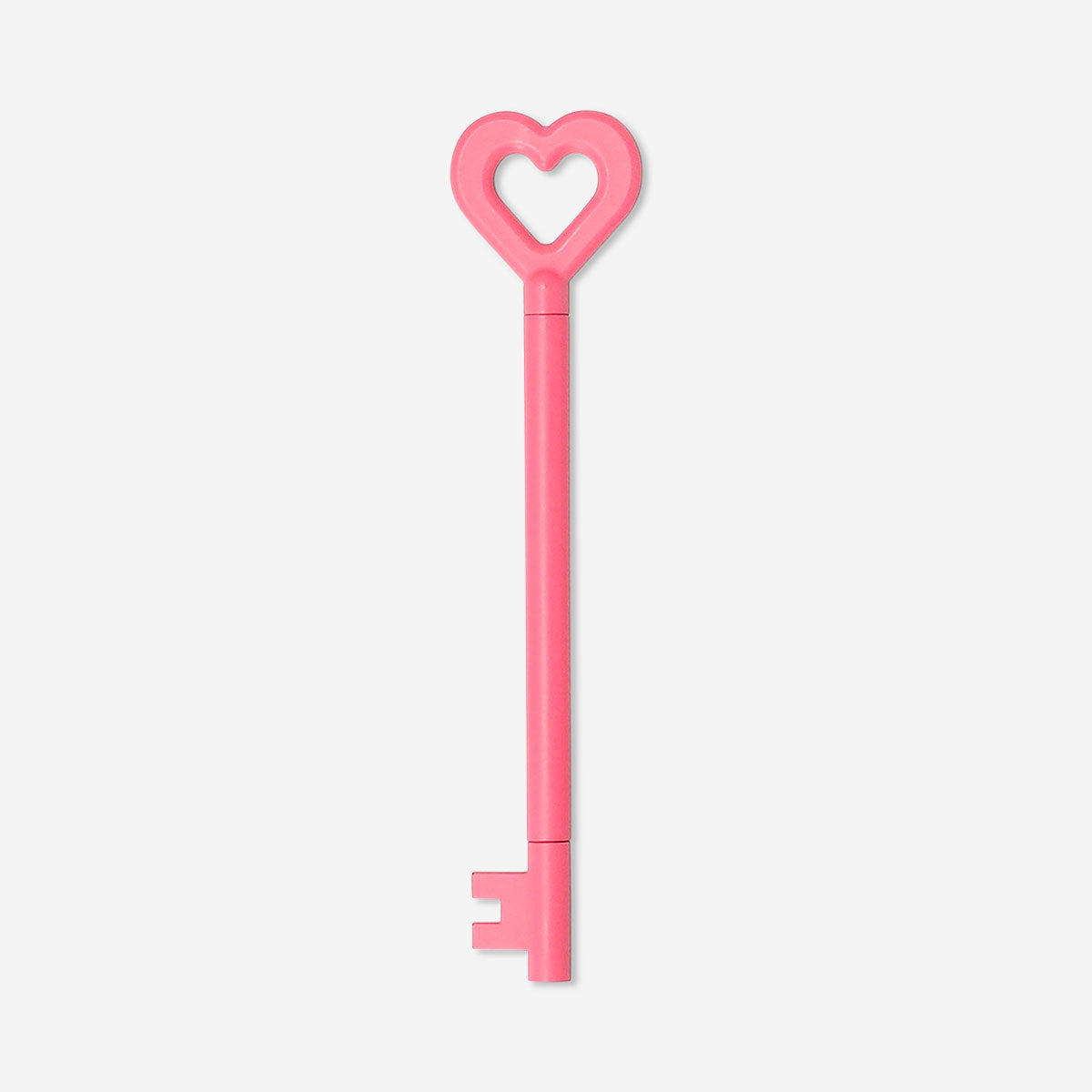 Pink heart-shaped key ballpoint pen from Flying Tiger Copenhagen, stylish office writing instrument with playful design.