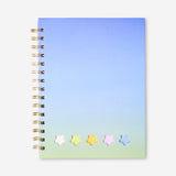Flying Tiger Copenhagen A5 gradient notebook with matching pen and sticky memos, ideal for office or note-taking use.