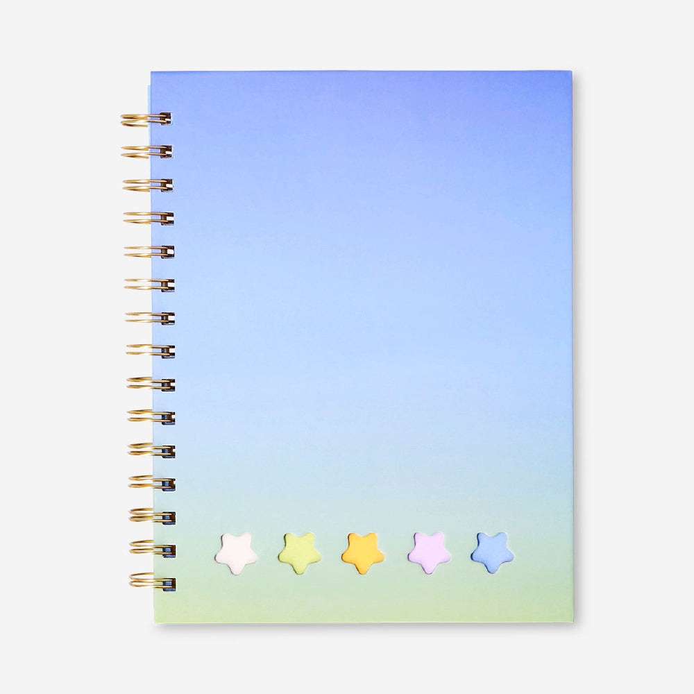 Flying Tiger Copenhagen A5 gradient notebook with matching pen and sticky memos, ideal for office or note-taking use.