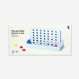 Flying Tiger Copenhagen 4 in a Row game with colorful plastic pieces and game board for fun family play.