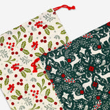 Two Christmas print drawstring gift bags for office use, featuring festive holiday designs from Flying Tiger Copenhagen.