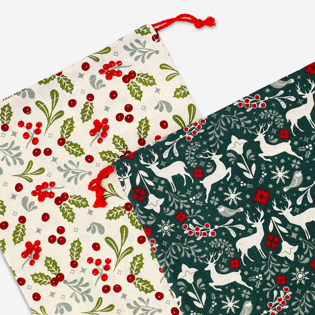 Two Christmas print drawstring gift bags for office use, featuring festive holiday designs from Flying Tiger Copenhagen.