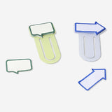 Set of two Flying Tiger Copenhagen office paper clips with sticky memos attached, suitable for organizing documents and notes.