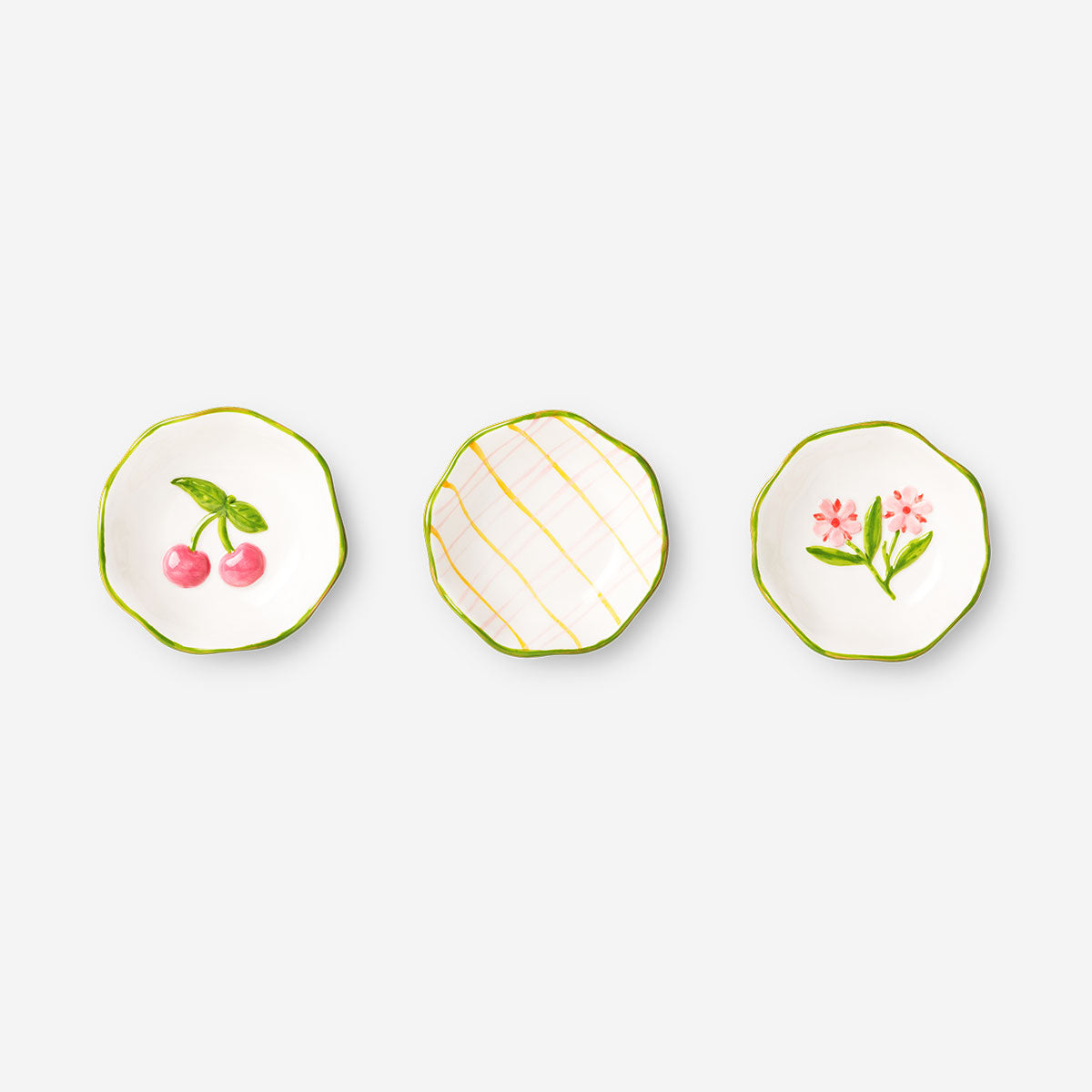 Set of three Ceramic bowls with spring flower designs from Flying Tiger Copenhagen for kitchen use.