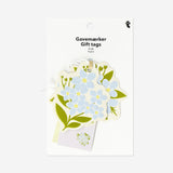 Set of four Flying Tiger Copenhagen flower-themed gift tags for office or gift wrapping, featuring colorful floral designs.