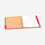 Flying Tiger Copenhagen Christmas planner for office use, featuring festive design and organization pages for holiday planning.