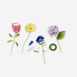 Flying Tiger Copenhagen DIY paper flowers kit for crafting colorful, decorative paper flower arrangements at home.