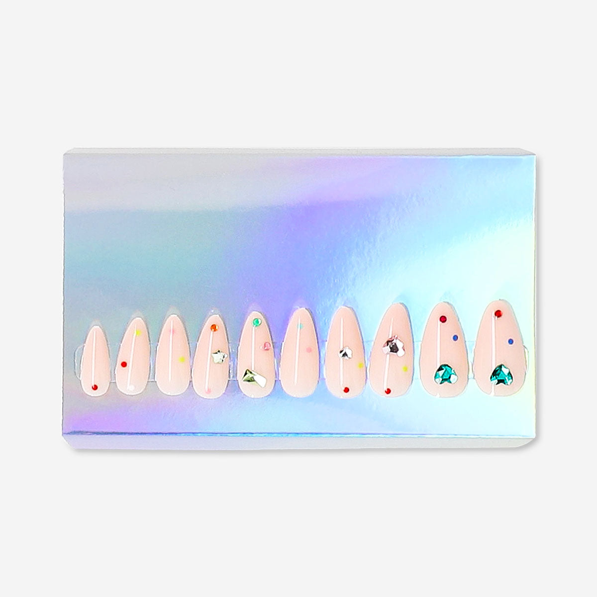 Flying Tiger Copenhagen press-on nails with heart and rhinestone designs, showcasing a stylish and decorative personal care accessory.
