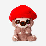 Soft plush toy sloth with a mushroom hat by Flying Tiger Copenhagen, featuring a cuddly sloth with detailed fur and a whimsical mushroom accessory.