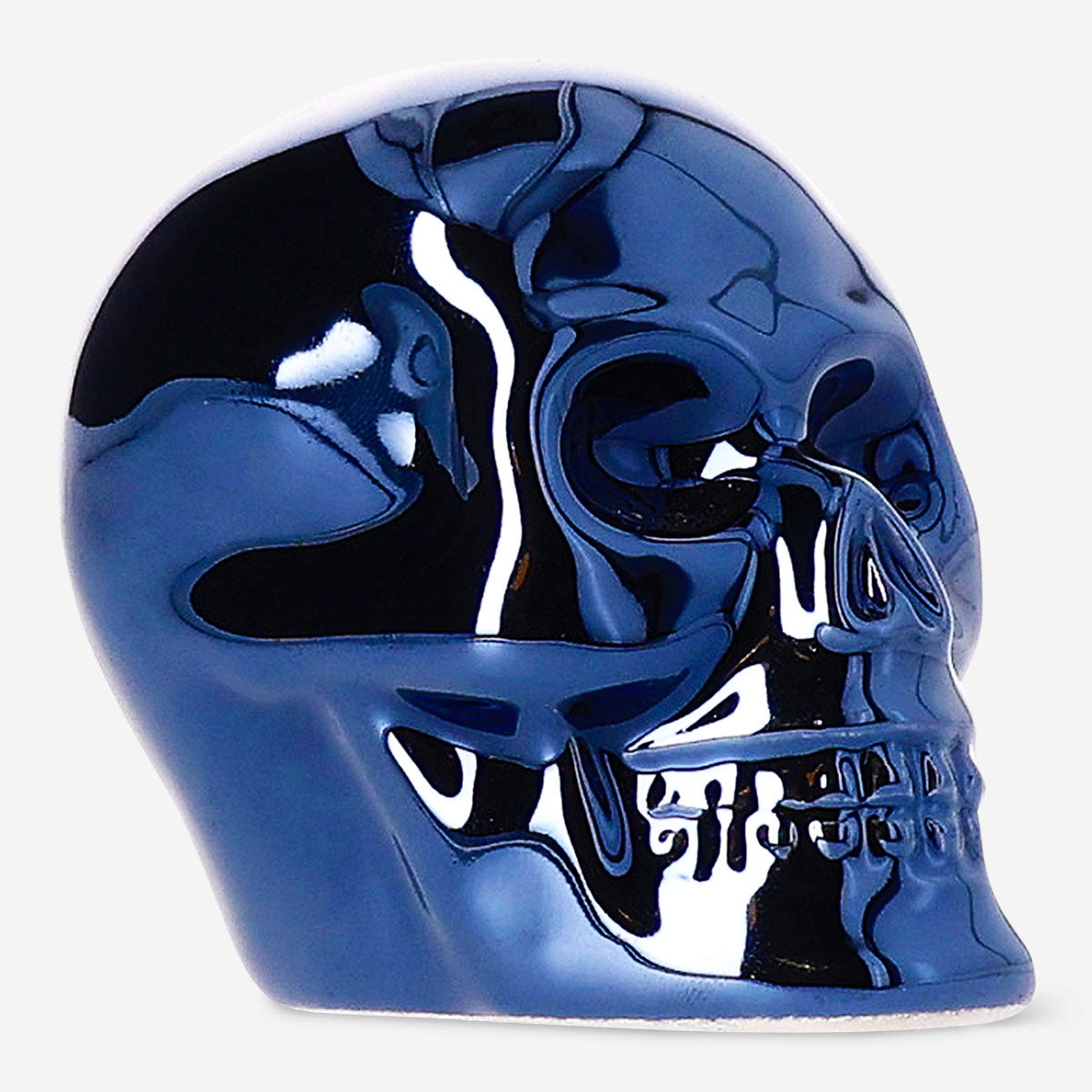 Set of three black skull tealight candles for home decor, featuring detailed skull designs by Flying Tiger Copenhagen.